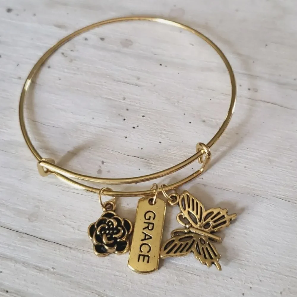 Bracelets by Sandra gold tone adjustable, Grace